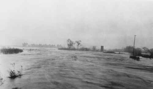 San Diego River in flood looking west from the Lakeside Bridge.